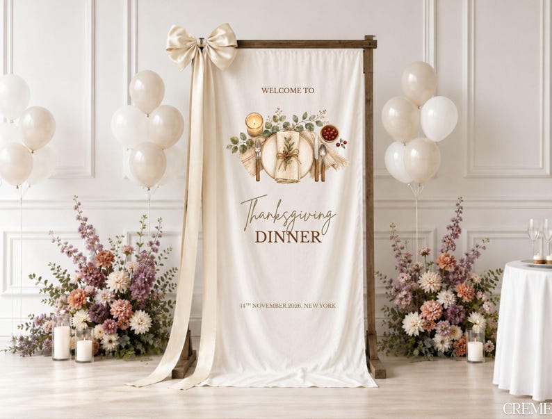 May include: A vertical cream-colored fabric banner on a wooden stand, featuring a printed illustration of a place setting with a candle and berries. The text reads "WELCOME TO Thanksgiving DINNER 14TH NOVEMBER 2025, NEW YORK" with a large cream bow.