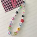 Trendy Y2K Phone Charm \u2013 Beaded Kawaii Wrist Strap \u2013 Colorful Funky Accessory for Phone, Bag, Camera \u2013 Handmade Gift for Her