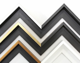 May include: Four picture frames in different colors and styles. The frames are arranged in a zig-zag pattern, with the largest frame at the bottom and the smallest frame at the top. The frames are all made of wood and have a simple, modern design.