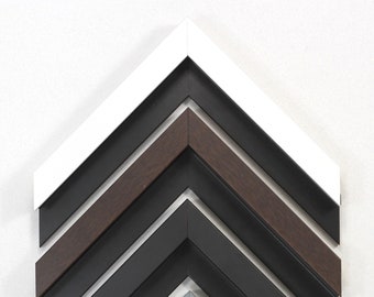 May include: A collection of eight picture frames with different colored and textured frames. The frames are arranged in a chevron pattern, with the white frame at the top and the black frame at the bottom.