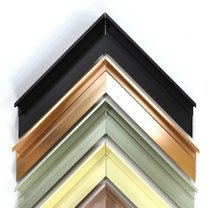 May include: A variety of picture frame corners in different colors, including black, gold, green, yellow, rose gold, and white.