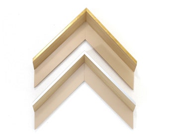 May include: Two picture frames, one with a gold finish and one with a white finish, both with a cream-colored mat.