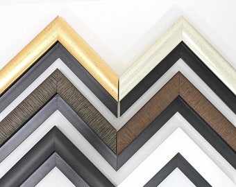 May include: A set of six picture frames with different colored and textured frames. The frames are arranged in a staggered pattern, with the gold frame at the top and the black frame at the bottom.