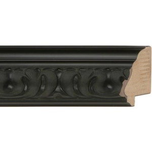 May include: Black picture frame with an ornate, carved design. The frame has a slightly raised edge and a smooth, flat surface.