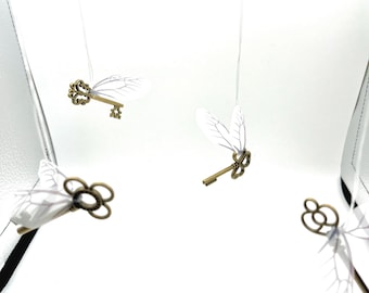 Wizarding Flying Keys Ornaments Set of 4 Winged Skeleton Key Themed Room Decor