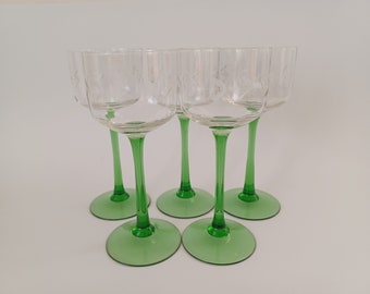 5 green-stemmed wine glasses with cut around 1900