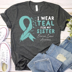 I wear Teal For My Sister-Ovarian Cancer Shirt,Ovarian Cancer Awareness Month,Teal Ribbon Shirt,Ovarian Survivor Shirt,Ovarian Awareness Tee