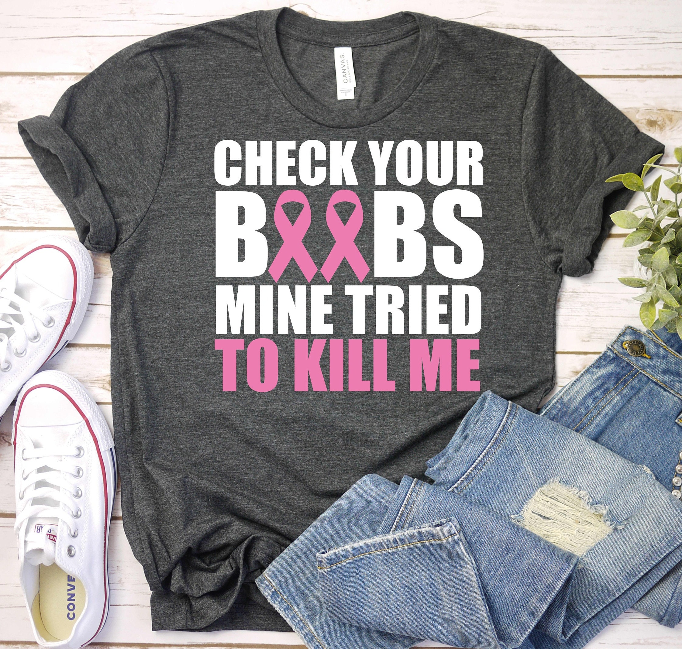 Check Your Boobs Mine Tried To Kill Me Breast Cancer T-Shirt Check Your Boobs Mine Tried To Kill Me Breast Cancer T-Shirt