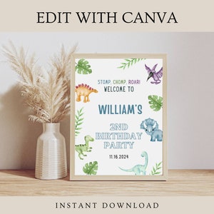 May include: A framed sign with a light beige background, featuring watercolor illustrations of dinosaurs and tropical leaves. The sign reads "WELCOME TO WILLIAM'S 2ND BIRTHDAY PARTY 11.16.2024" in blue and white text. The words "EDIT WITH CANVA" and "INSTANT DOWNLOAD" are also visible.