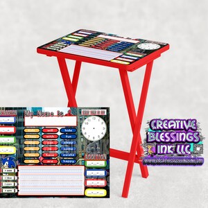 May include: Red folding table with a colorful printed tabletop featuring a clock, a grid, and a Sonic the Hedgehog character. The table top also has a section labeled "My Name is" with lines for writing. The table is on a white background.