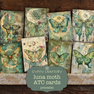 May include: Set of eight printable ATC cards featuring luna moths with a vintage aesthetic. The cards have a distressed background with a crescent moon and stars. The text "Gypsy Craftery luna moth ATC cards printable" is at the bottom of the image.