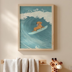 May include: A framed art print shows a golden retriever surfing a large blue wave. The dog is on a light blue surfboard. The artwork is in a light wood frame and hangs on a beige wall. A towel rack and soft toys are in the foreground.