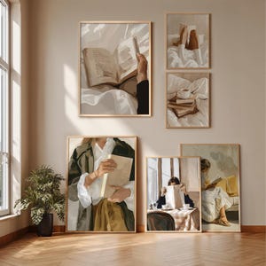 May include: A collection of framed art prints featuring scenes of reading. The artwork depicts people reading books in various settings, including a bed, a table, and outdoors. The color palette is soft, with neutral tones and warm accents.