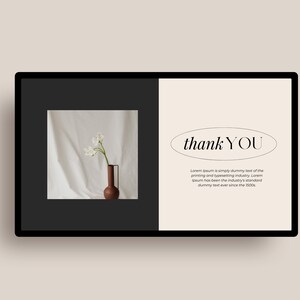 May include: A thank you card with a white background and black text. The text says "thank YOU" in a circle. The card also has a small image of white flowers in a brown vase.