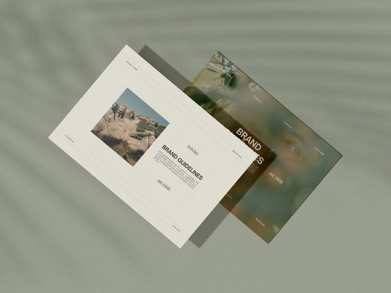 Op de afbeelding: Een wit document met de tekst "Brand Guidelines" en een foto van een rotsachtig landschap. Het document ligt bovenop een tweede document met de tekst "Brand Values" en een wazige foto van een gezicht.