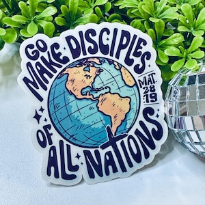 May include: A sticker with a blue and yellow globe with a cross on it. The text around the globe says "Go Make Disciples of All Nations" and "Mat. 28:19".