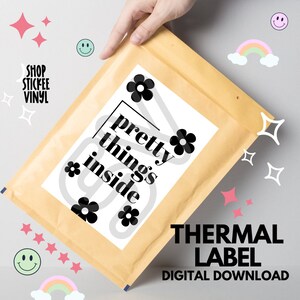 May include: A brown paper envelope with a white label that says "pretty things inside" with black flowers and text. The label also says "THERMAL LABEL DIGITAL DOWNLOAD".