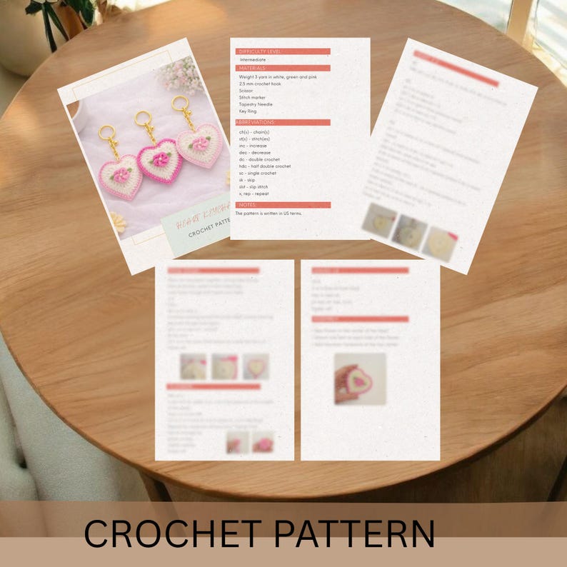 May include: A crochet pattern for heart-shaped keychains with floral accents. The image shows the finished keychains in pink and white, along with the pattern instructions. The text "CROCHET PATTERN" is at the bottom.