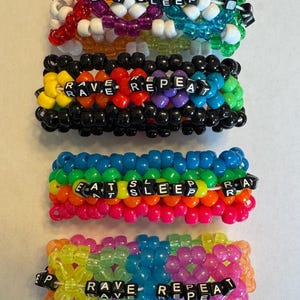 Eat Sleep Rave wiederholen Kandi Manschette Armband