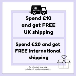 May include: Black and white graphic of a delivery truck with the text "FREE SHIPPING" above it. The text below the truck says "Spend &pound;10 and get FREE UK shipping" and "Spend &pound;20 and get FREE international shipping". The text at the bottom says "for a limited time only includes all products in the shop".