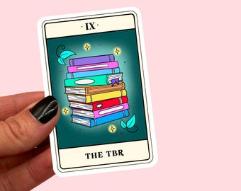 May include: A tarot card with a blue background and a stack of colorful books. The card is labeled "IX. THE TBR".