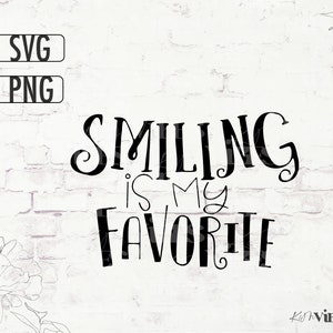 May include: Black and white typography design on a white brick background. The text reads "Smiling is my favourite".