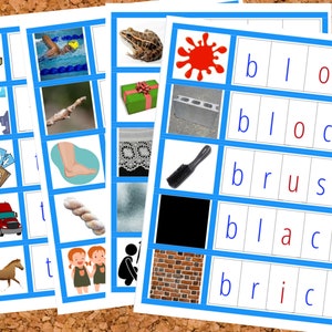 Può includere: Flashcard educative con immagini e parole. Le carte presentano varie illustrazioni, tra cui una rana, una macchia rossa e un camion. Le parole sulle carte includono "blob", "block", "brush", "black" e "brick". Le carte sono incorniciate con un bordo blu.