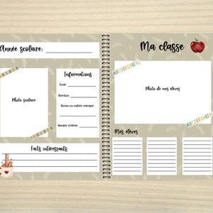 K&ouml;nnte beinhalten: Offenes Notizbuch mit Spiralbindung, mit Seiten f&uuml;r schulbezogene Informationen. Die Seiten enthalten Abschnitte f&uuml;r Fotos, Sch&uuml;lerdetails und interessante Fakten. Dekorative Elemente sind farbiges Klebeband und eine rote Apfelillustration.