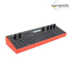 May include: A black and red Korg SQ-64 music sequencer with 64 pads and 8 knobs. The sequencer has a small LCD screen and a red plastic casing.