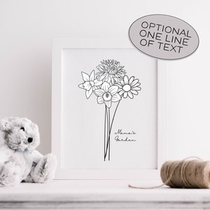 May include: A framed black and white floral line art print featuring a bouquet of flowers, including daffodils and daisies. The text "Mama's Garden" is written below the flowers. A stuffed teddy bear and a ball of twine are in the foreground.