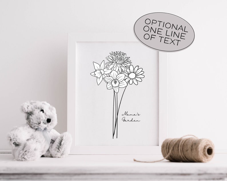 May include: A framed black and white floral line art print featuring a bouquet of flowers, including daffodils and daisies. The text "Mama's Garden" is written below the flowers. A stuffed teddy bear and a ball of twine are in the foreground.