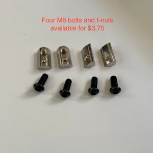 Puede incluir: Cuatro tuercas en T plateadas y cuatro tornillos negros. Cuatro tornillos y tuercas en T M6 disponibles por 3,75 &euro;