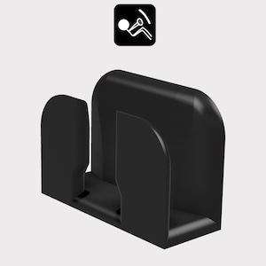 May include: Black plastic phone stand with a curved design. The stand has two slots for holding phones or other devices.
