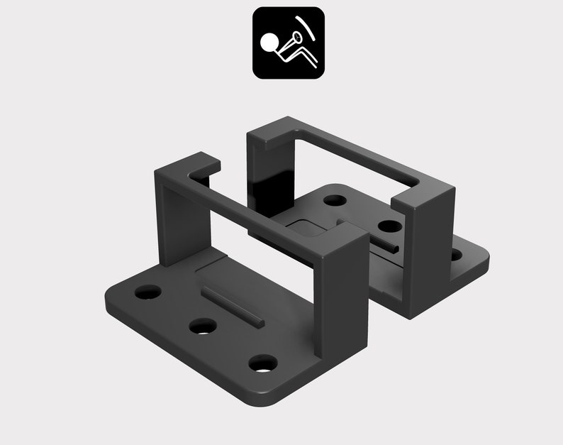 May include: Two black metal brackets with a rectangular opening. The brackets have a flat base with four holes for mounting.