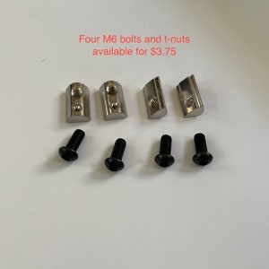 May include: Four silver T-nuts and four black screws.  Four M6 bolts and t-nuts available for $3.75