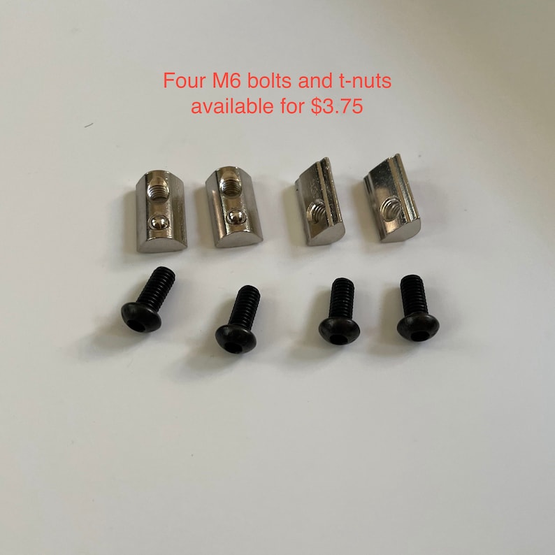 May include: Four silver T-nuts and four black screws.  Four M6 bolts and t-nuts available for $3.75