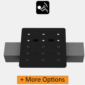 May include: Black metal plate with multiple holes and a slot in the center. The plate is mounted on two gray rectangular blocks.