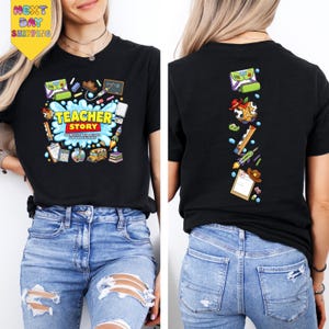 May include: A black t-shirt featuring a front graphic with the text "TEACHER STORY" surrounded by school supplies and a back graphic featuring a vertical column of various school-themed icons including a rocket, a cowboy hat, and a paper.