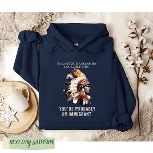 a hoodie with an indian headdress on it