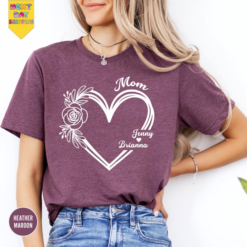 a woman wearing a t - shirt that says mom, happy birthday