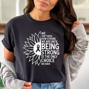 We Don&#39;t Know How Strong Shirt, Cancer Survivor Shirt, Cancer Fighter Shirt, Cancer Awareness Shirt, Stronger Than Cancer Shirt, Cancer Tee