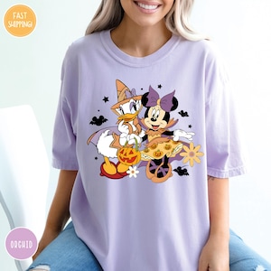 Comfort Colors® Vintage Minnie Daisy Halloween Shirt, Disney Halloween Shirt,WDW Disneyland Halloween Girls Trip 2025, Besties Halloween Tee