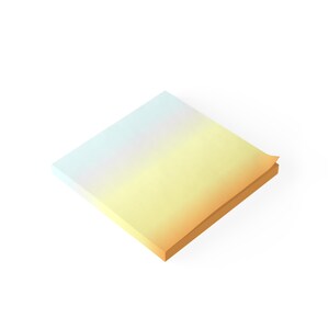 May include: A stack of pastel yellow, orange, and blue sticky notes with a gradient effect.