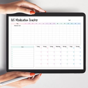 May include: A digital IVF Medication Tracker displayed on a tablet. The tracker features a grid for medication and date entries, a notes section, and a calendar. The text "IVF Medication Tracker" is at the top. The tablet is held by hands.