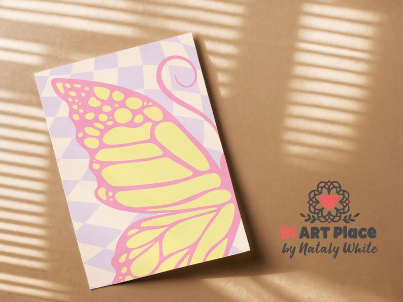 May include: A print featuring a butterfly wing design in yellow and pink, set against a checkered background of light purple and white. The artwork is on a rectangular paper, with the artist's logo in the bottom right corner.
