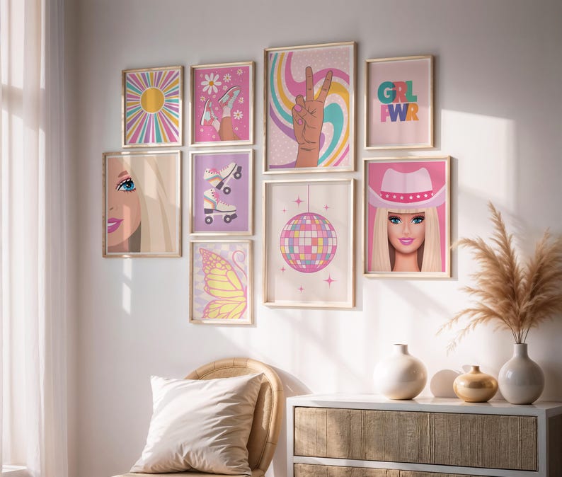 May include: A collection of framed art prints with a retro theme. The prints feature images of a sun, roller skates, a peace sign, a disco ball, a butterfly, and a portrait of a woman wearing a cowboy hat. The color palette includes pink, yellow, and blue.
