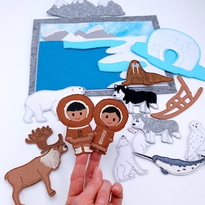 Page du livre Arctic Quiet : Motif de broderie marionnettes à doigt en feutre ITH Motifs de broderie Machine