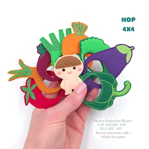 May include: A collection of felt machine embroidery designs featuring a small beige character with brown hair surrounded by colorful vegetable shapes including a red tomato, orange carrot, purple eggplant, and green pepper with text HOP 4X4.