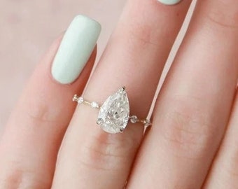 Dainty Pear Simulated Diamond Engagement Ring: Sterling Silver Hidden Halo