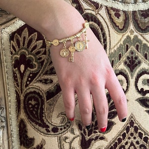 Saint Benedict Gold Tone Medal Charm Stretch Bracelet